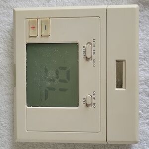 Pro1 T701 Non Programmable Thermostat.  Used